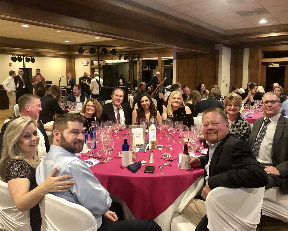 Picture of people at a gathering.