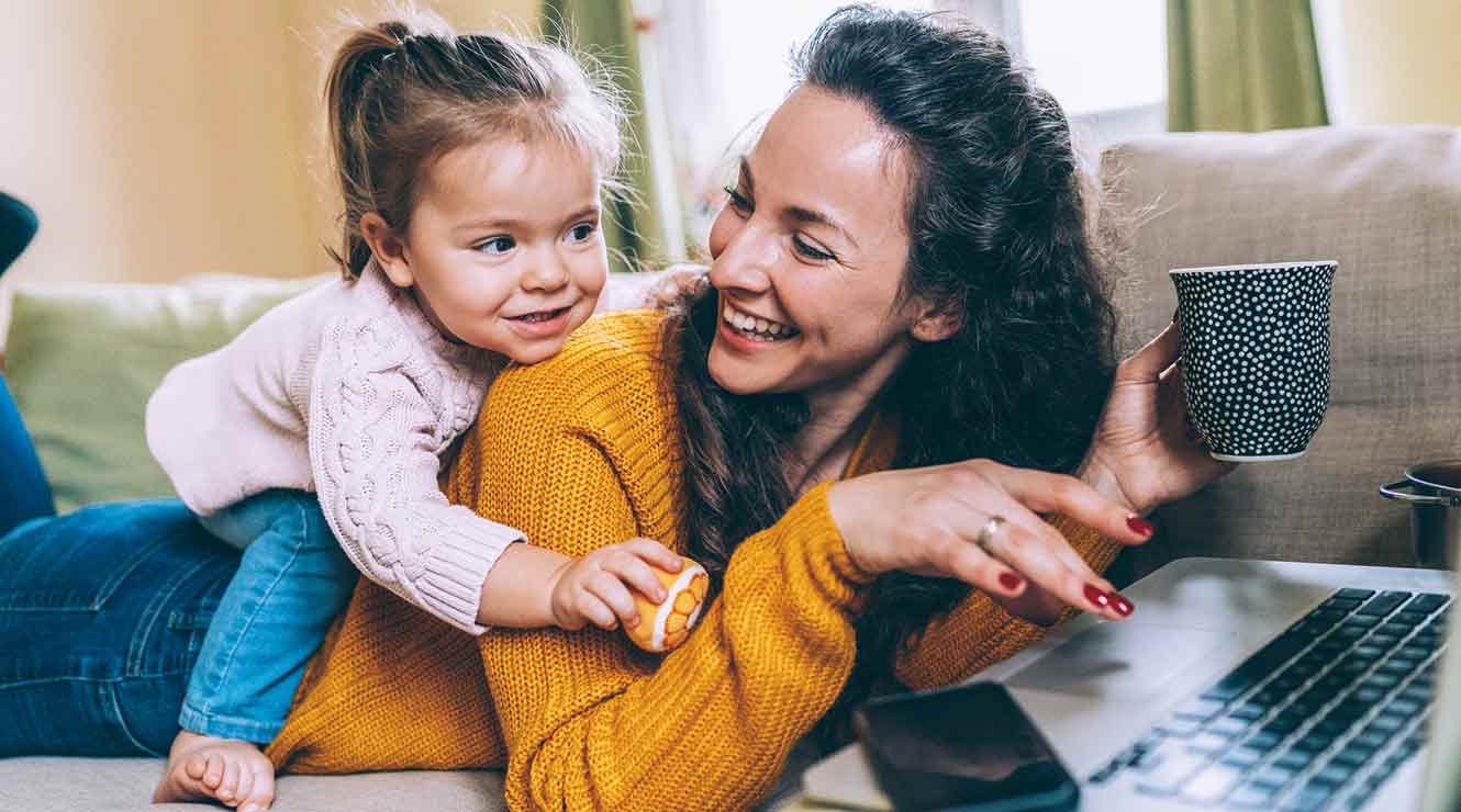 Image of mom and daughter at computer.